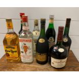 A Selection of eight bottles of various liqueurs and spirits.