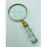 A Brass cased Hand Held Magnifying glass