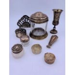 A Selection of silver items to include pill boxes, napkin ring, pots and a stamp.