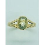 A 22ct yellow gold ring with yellow stone setting (6g)