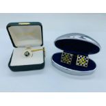 A Masonic themed tie pin and cuff links
