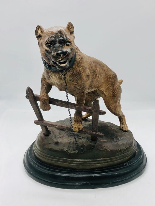 An impressive cold painted bronze figure of a dog signed.