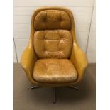A lovely example of a mid century leather swivel and tilting chair circa 1960's, possibly Danish and