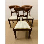 Three Regency mahogany chairs with cotton seat pads.