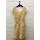A vintage cream fitted Taperwork dress by Germaine Gers of La Crosiette Cannes (Approx Size 8)