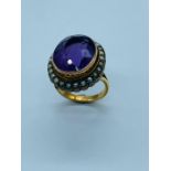 A Victorian Amethyst and seed Pearl ring on new 9ct yellow gold mount.