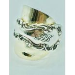 A hallmarked silver spoon ring handcrafted by Boochi and Co from antique silver cutlery, each ring