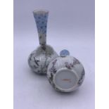 A pair of oriental theme bud vases