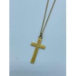 A 9ct gold chain with cross (2.6g)