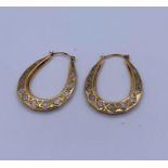 A Pair of 9ct gold earrings (1.04g)