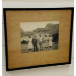 A framed holiday photograph of King George V, the Queen Mother and the Princesses Margaret and