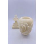 A pair of Victorian alabaster vases on square plinth and carved roses to each