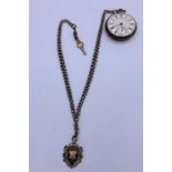 A silver pocket watch and albert chain.