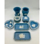 A selection of eight pieces of Wedgwood Blue Jasperware