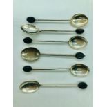 A set of Dutch silver spoons with coffee bean handles