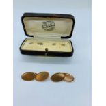 A cased set of 9ct gold Gents cuff links (7g)