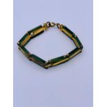 A 9ct gold and Jade bracelet