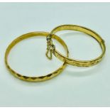 Two Ladies 9ct yellow gold bracelets with metal cores.