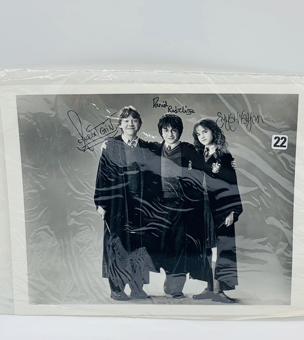 A Signed Cast photograph from Harry Potter obtained from filming in Windsor, Rupert Grint, Daniel