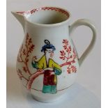 A Worcester baluster sparrow-beak cream jug with grooved loop handle painted in polychrome enamels