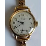 A mid-20th century ladies 9ct gold wristwatch for Vertex Revue, Swiss mechanism, Arabic numerals,