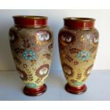 A pair of Royal Doulton Slaters patent baluster vases with gilt heightened incised floral