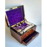 A Victorian burr walnut vanity box with lift-out ten silver plate-topped bottles and jars, concealed