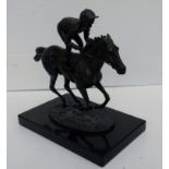 David Cornell, CHAMPION FINISH, bronze model of a racehorse and jockey, signed and dated 1985, 19