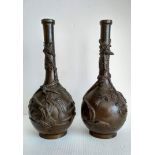 A pair of Japanese Meiji period bronze bottle vases with applied bird and foliate decoration, each