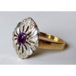 A mid-20th century yellow and white gold amethyst-set ring, size T, hallmarked, 6.87g