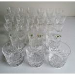 A set of six Waterford Crystal whisky tumblers, six sherry (one chipped to rim), six liqueur, etc