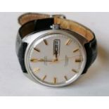 A vintage Omega Automatic Seamaster Cosmic, stainless steel case, numbered 166036 tool 107, cream