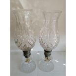 A pair of Thomas Webb tulip-shape diamond-cut crystal glass candle holders, each 41 cm H