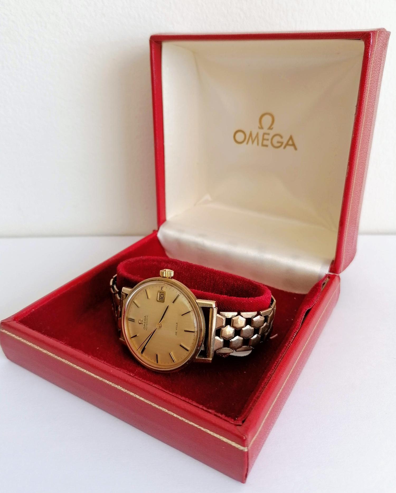 An early 1960s Omega Automatic De Ville wristwatch with champagne dial, baton markers, central