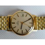 A vintage Omega men's wristwatch with sweeping seconds hand, date aperture, baton markers,