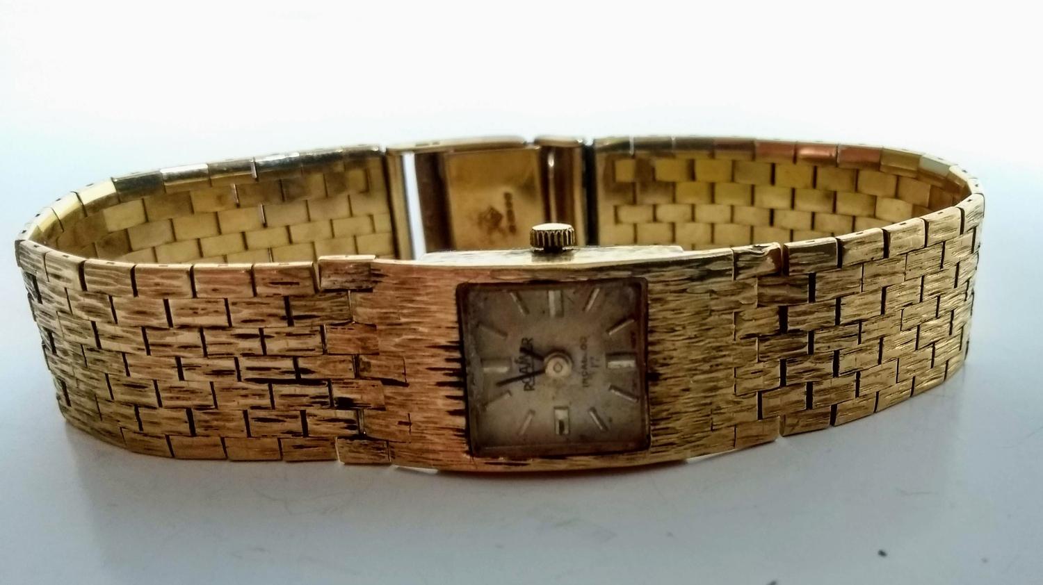 A 1970's Roamer incabloc 17 watch with bark-effect 9ct gold case and strap, not working, hallmarked,