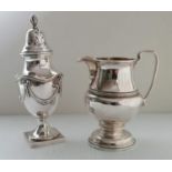 An Edwardian silver sugar shaker in the Adam style with bead and festoon decoration on a square base