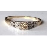 A single-stone diamond ring on an 18ct yellow gold and platinum setting: the old European-cut