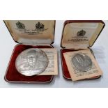 Two cased Winston Churchill medals commemorating his death, by Kovacs, Spink stamped silver to edge