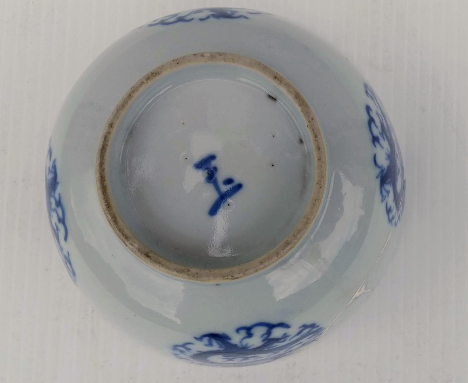 An assortment of Oriental porcelain to include: a blue and white baluster jar and cover with - Image 10 of 20