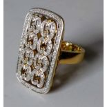 An 18ct yellow gold open work diamond-set dress ring with seventy-six 8-cut diamonds, 1mm each