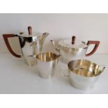 An Art Deco silver four-piece tea/coffee service by Alvic Products Ltd., Birmingham, 1947, 1119g