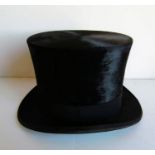 A silk-lined top hat by R. W. Forsyth, Princes Street, Edinburgh and Glasgow, internal diameter 20 x