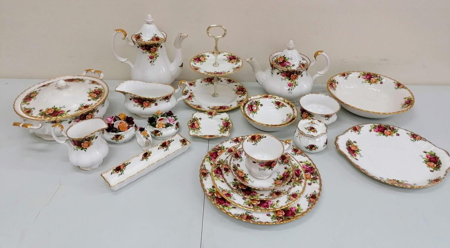 A Royal Albert sixty-piece, Old Country Roses tea and part-dinner service comprising six cups/