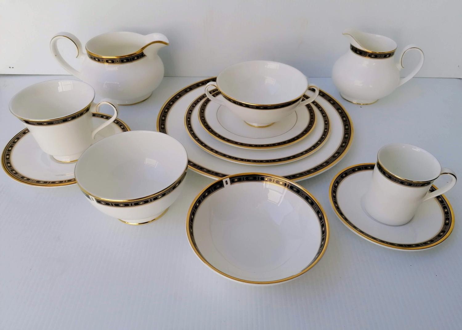 A Royal Doulton Monaco dinner sixty-three piece service, H5133 comprising: 10" dinner plates x 6, 8"