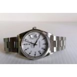 A Rolex Oyster Perpetual Date Automatic wristwatch, 34mm signed white dial, Roman numerals, model