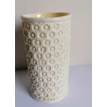 A Belleek Cleary pattern cylindrical vase, first period black mark, 12.5 cm H, without visible