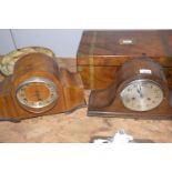 An early 20th Century oak cased Napoleon Hat mantle clock Having a 13cm silvered dial with two train