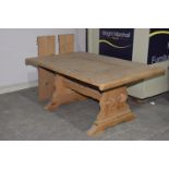 A rustic pine extending refectory table The rectangular slab top with scrolled ends and two extra
