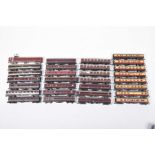 Twenty-nine unboxed N gauge coaches In red, red and silver and red and cream livery